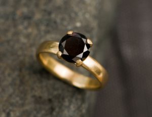 black diamond engagement ring in gold