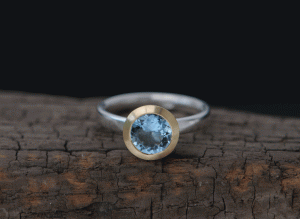 aquamarine-8mm-18K-gold-halo-and-silver-band-