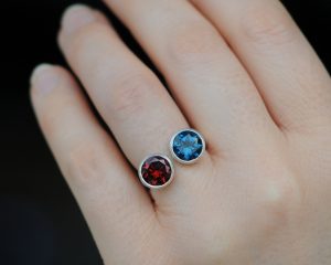 Red garnet and blue topaz owl ring in silver