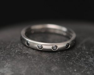 black diamond eternity band in platinum