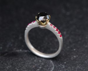 black diamond crown ring with little rubies