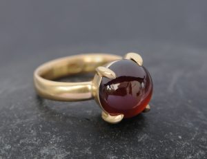 red garnet cab 12mm dragonseye ring in 18K