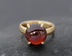 red garnet cab 12mm dragonseye ring in 18K