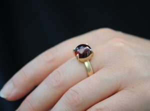 red garnet cab 12mm dragonseye ring in 18K