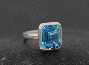 Swiss-blue-topaz-12x10-emerald-cut-in-silver