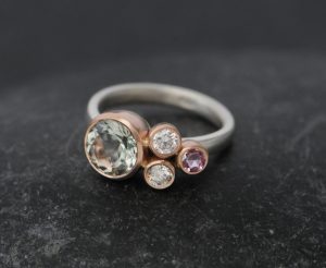 green amethyst 2 diamonds and pink sapphire cluster in 9K rose gold silver band