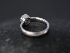 moissanite 6mm round bezel set in platinum