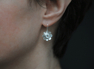 white-topaz-daisy-drop-earrings-in-silver