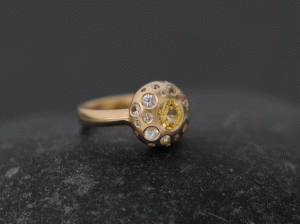 Yellow-sapphire-and-white-diamond-button-ring