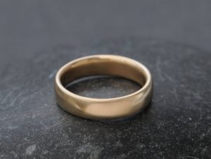 mans 5mm wedding band in 18K yellow gold