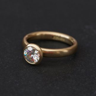 1.25ct moissanite halo ring in 18K y gold