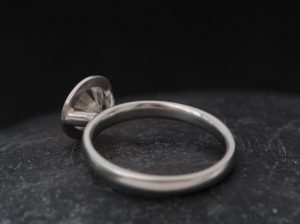 Moissanite 7mm halo ring in platinum
