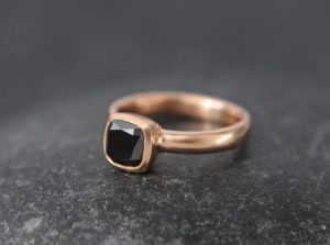 black diamond 6mm cushion ring in 18K r gold
