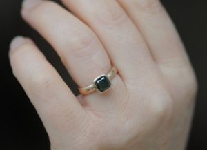 black diamond 6mm cushion ring in 18K r gold