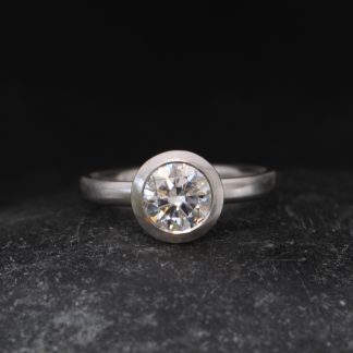 1.25 Carat Lab Diamond Halo Ring in Platinum
