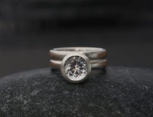 white topaz 8mm halo wedding set in silver