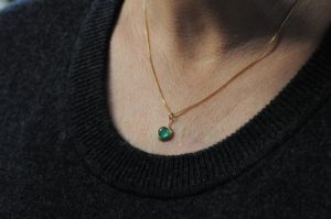 8mm lollipop necklace 18K gold. on model