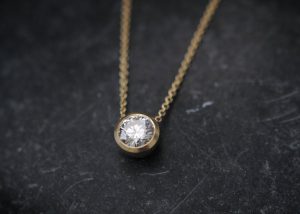 Moissanite 1 ct cup necklace in 18K yellow gold