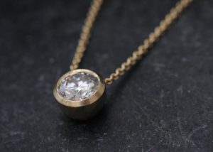 Moissanite 1 ct cup necklace in 18K yellow gold