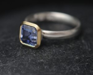 7mm-asscher-cut-lab-pale-sapphire-mixed-metal-halo-ring