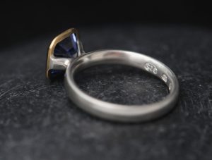 7mm-asscher-cut-lab-pale-sapphire-mixed-metal-halo-ring