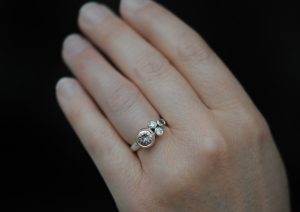 morganite cluster ring in 9K rose gold and silver on hand