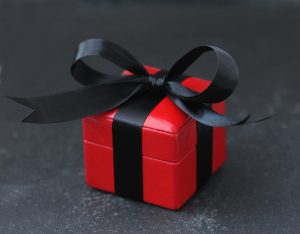 red leather ring box with bow