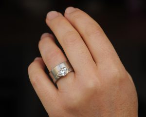 moissanite pear cut wedding set in mixed metal