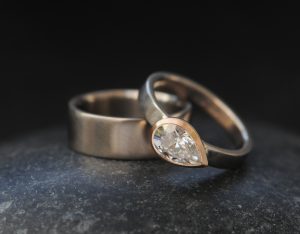 moissanite pear cut wedding set in mixed metal