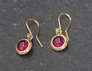 ruby cabs 6mm in 18K yellow gold drop earrings