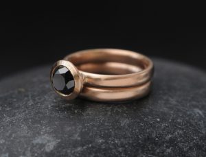 black diamond halo wedding set in 18K rose gold