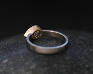 moissanite pear cut ring in mixed metals
