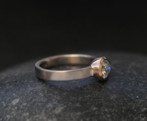 moissanite pear cut ring in mixed metals