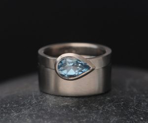 sky-blue-topaz-pear-cut-wide-band-wedding-18K-White-gold