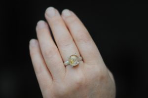 rutilated quartz 12mm cab dragons eye ring silver on hand