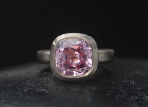 Lab-pink-sapphire-9mm-halo-set-in-18K-white-gold