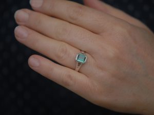 green tourmaline octagon cut split shank ring in silver on hand
