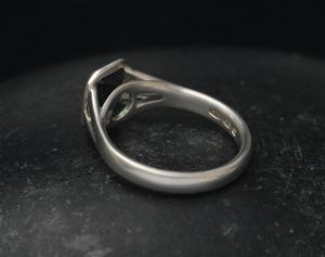green tourmaline octagon cut split shank ring in silver reverse
