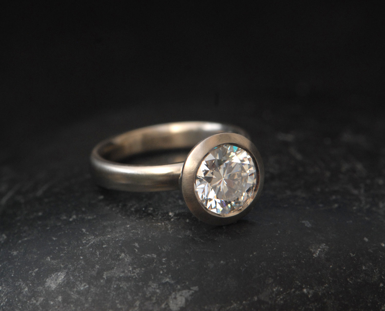 ab-diamond-8mm-halo-ring-in-18K-white-goldside-shot-2