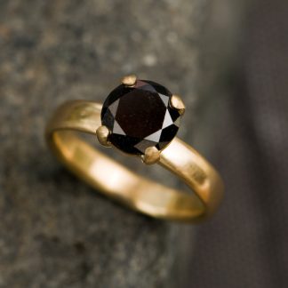 black diamond engagement ring in gold