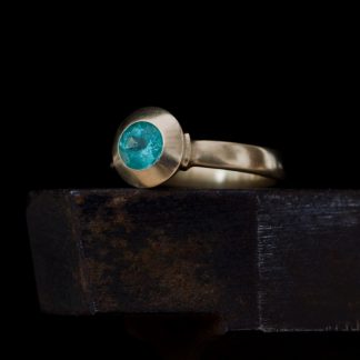 Blue green Columbian emerald set in 18k gold ring