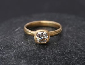 moissanite cushion cut engagement ring in recycled gold