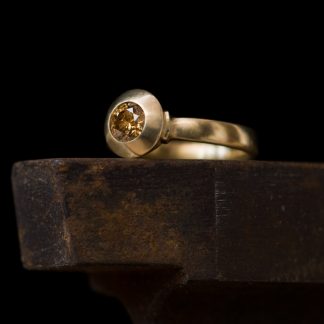Brown diamond engagement ring set in 18k gold. By William White