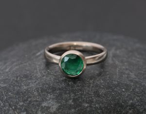 natural emerald set in gold ring