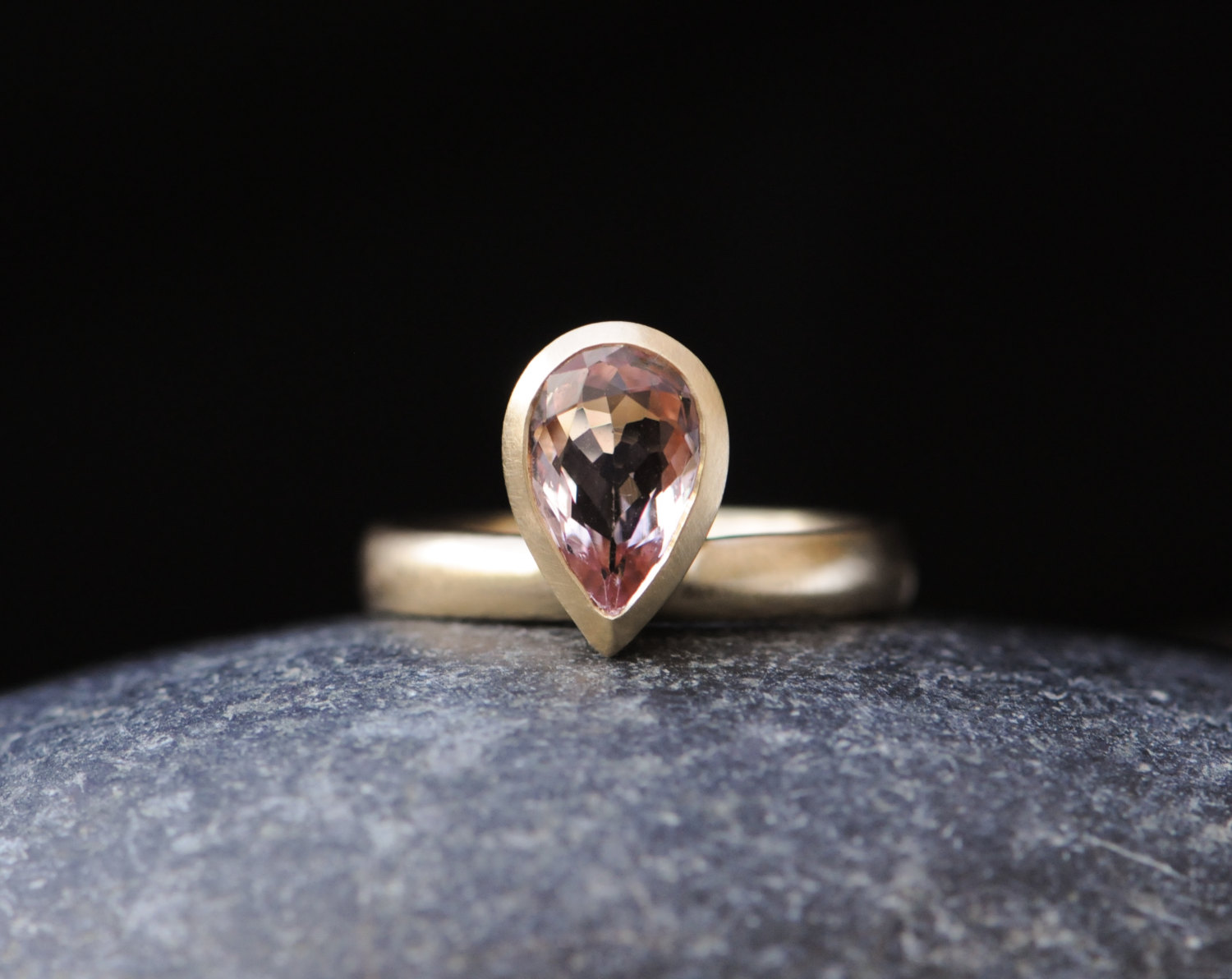 Pale pink pear cut morganite ring in gold. By William White.