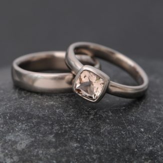 cushion cut morganite set in 18k gold ring, with matching wedding band. By William White