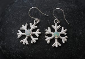 Magical looking Opal snowflake earrings, set in sterling silver. Very pretty snowflake earrings designed and handmade by William White in Cornwall, UK