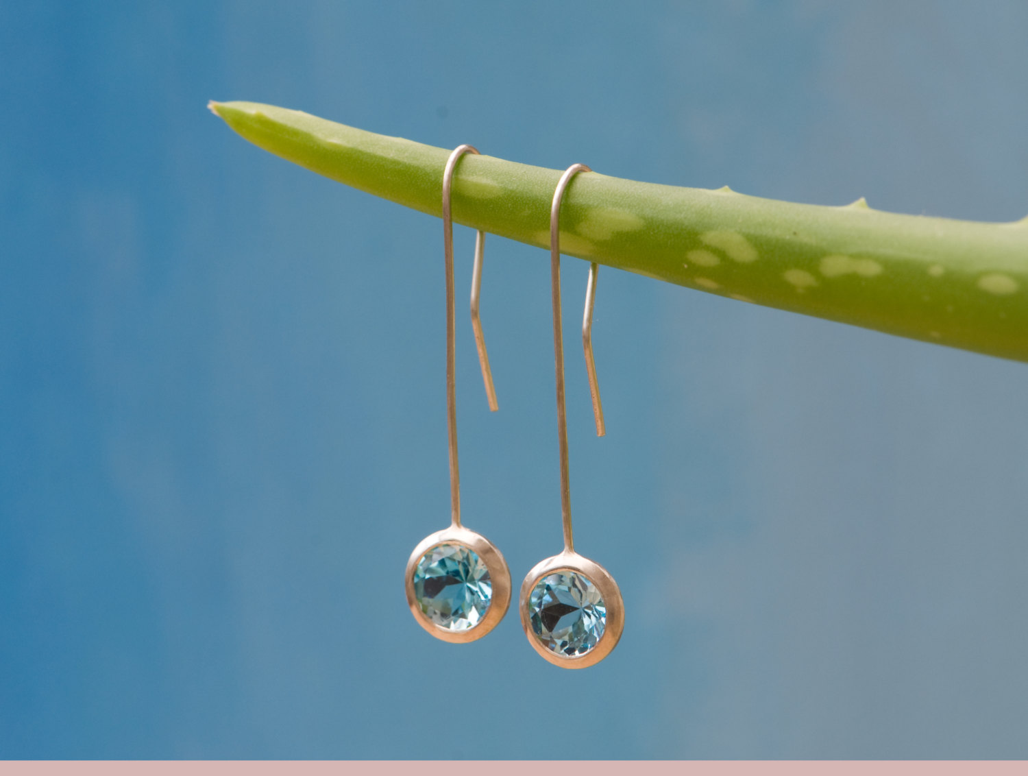 Swiss blue topaz lollipop earrings in silver. By William White