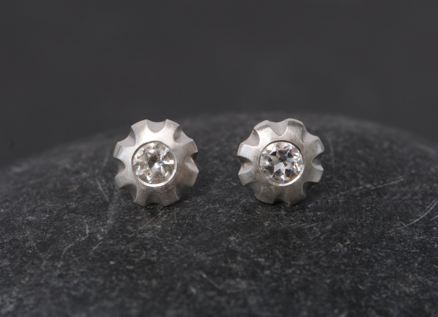 Simple White topaz flower earrings, set in sterling silver. Earrings 10mm across, stones 5mm across. Designed and handmade by William White in Cornwall, UK