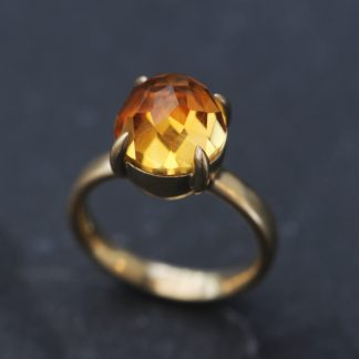 Large rose cut citrine cabochon claw set in gold ring
